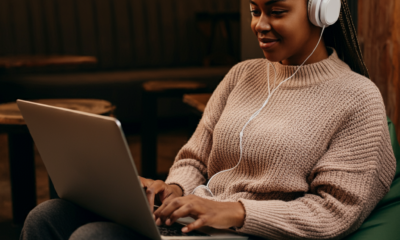 woman in her mid 30s listening to music